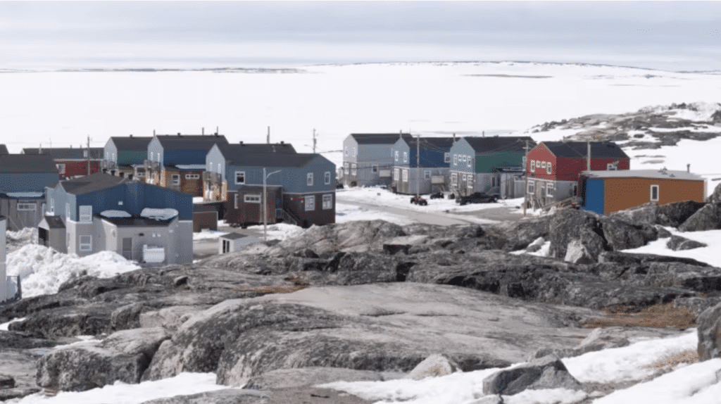 Homes face the Hudson Bay in Inukjuak, Que.