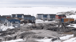 Homes face the Hudson Bay in Inukjuak, Que.