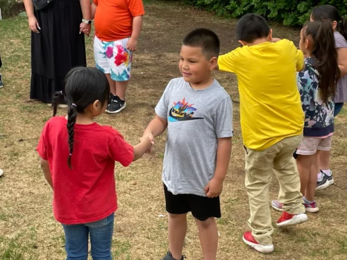 Oceti-students-shaking-hands